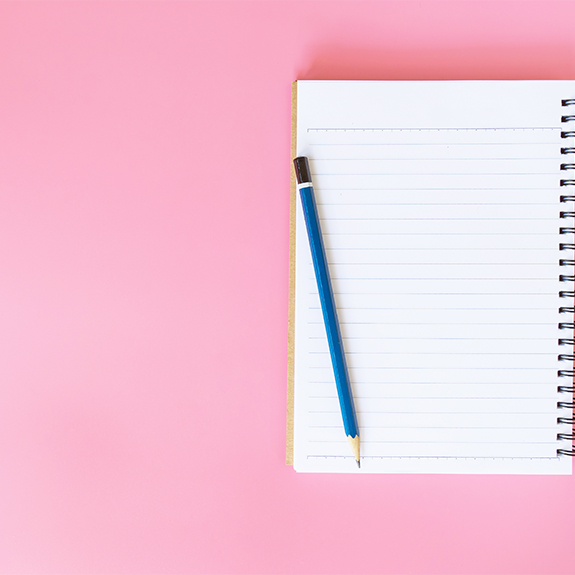 Notebook and pencil